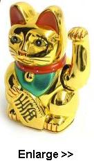 Gold colour money cat and moving arm