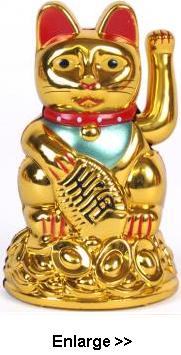 Small gold money cat with waving paw